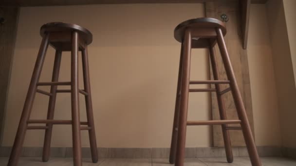 Side Moving Footage Three Wooden Bar Stools — Stock Video