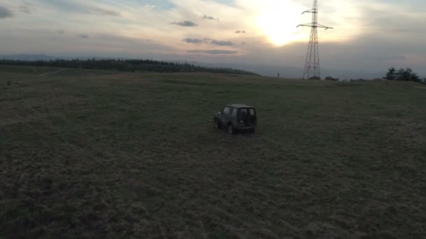 Aerial View Jeep Driving Field — Stock Video