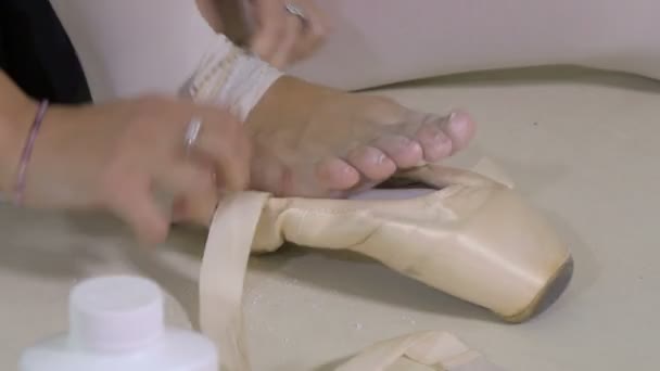 Hands Putting Ballet Shoes – stockvideo