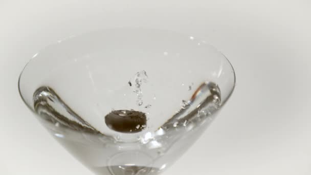 Dropping Olive Martini Glass Ultra Slow Motion — Stock Video