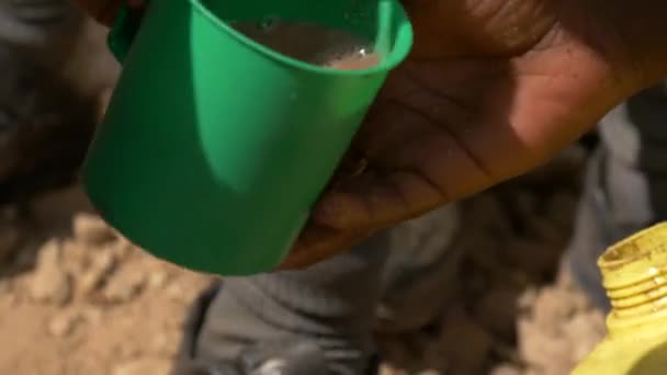 Footage Uganda Lifestyle Pouring Cocoa Mugs — kuvapankkivideo