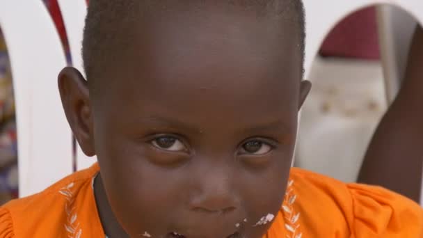 Footage Uganda Lifestyle Close View African Child Eating — kuvapankkivideo