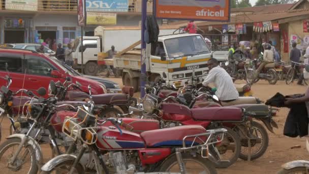 African Man Parked Motorbikes — Stock Video