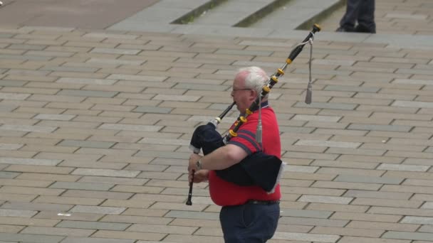 Man Red Shirt Playing Bagpipes — Stock Video