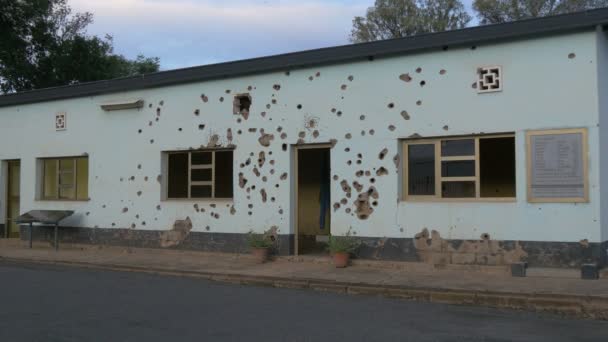 Bullet Ridden Wall Kigali Camp — Stock Video