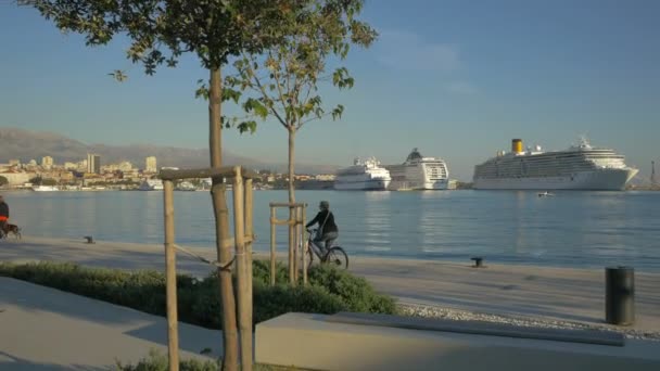 Walking Riding Bikes Waterfront — Stock Video