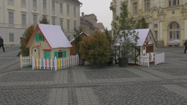 Τρία Ξύλινα Σπιτάκια Χριστουγεννιάτικη Αγορά — Αρχείο Βίντεο