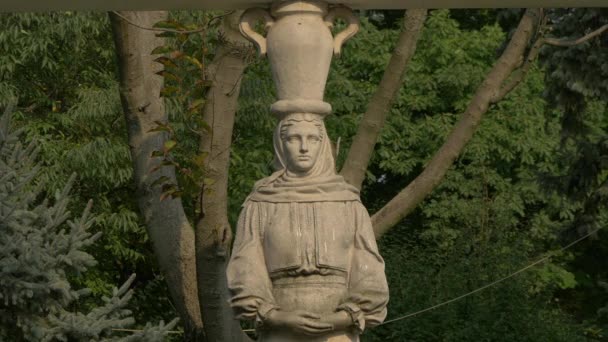 Woman Statue Pot Her Head — Stock Video