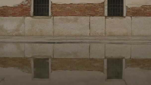 Brick Building Reflected Water — Stock Video