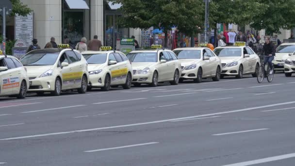 Yellow Taxi Cars Parked Sidewalk — Video