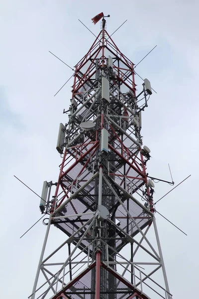 Telephone antenna on top of the mountain