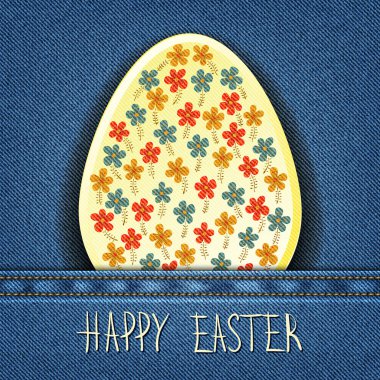 Denim arka plan üzerinde Paskalya yortusu yumurta