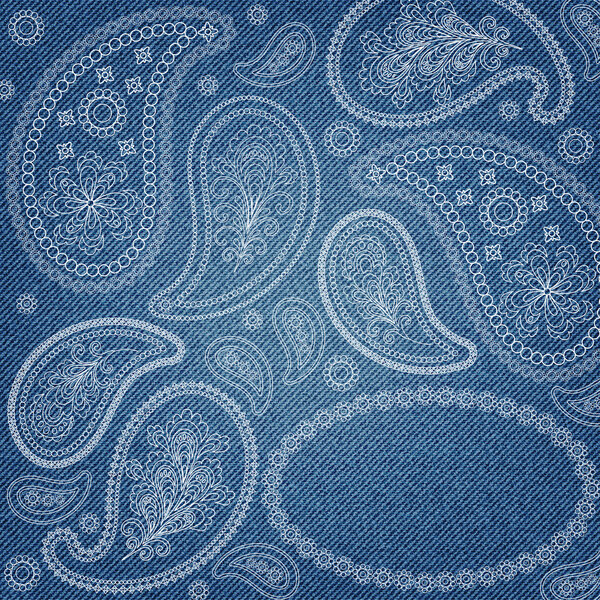 Denim background with ornate paisley pattern