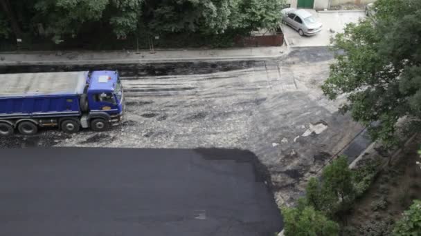 Construction team  asphalting road — Stock Video