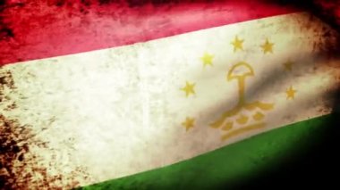 Tacikistan bayrağı sallayarak