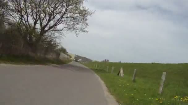 Ridding a bicycle on a road — Stock Video