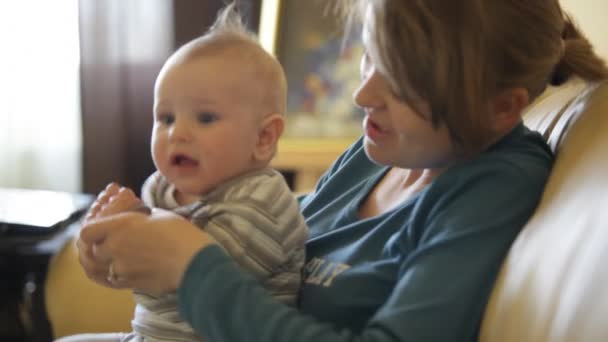 Boy in mother arms — Stock Video