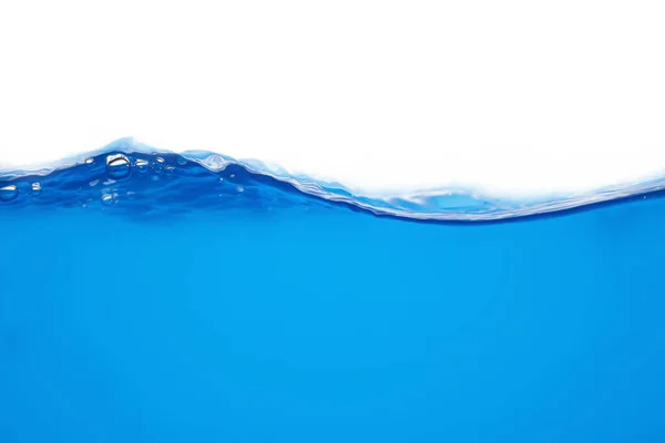 The surface of blue water that is splattered or moving