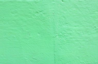 Güneşteki yeşil havan topunun yüzeyi.