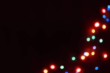 Yuvarlak Noel ışığı ve kutlamaların soyut uydurma arka planı.