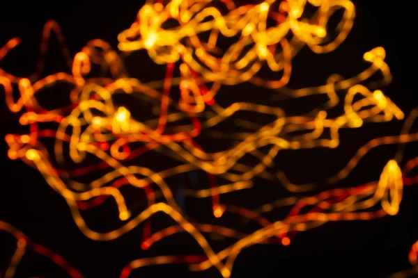 Bulanık Siyah Arkaplandaki Işık Soyut Resmi — Stok fotoğraf