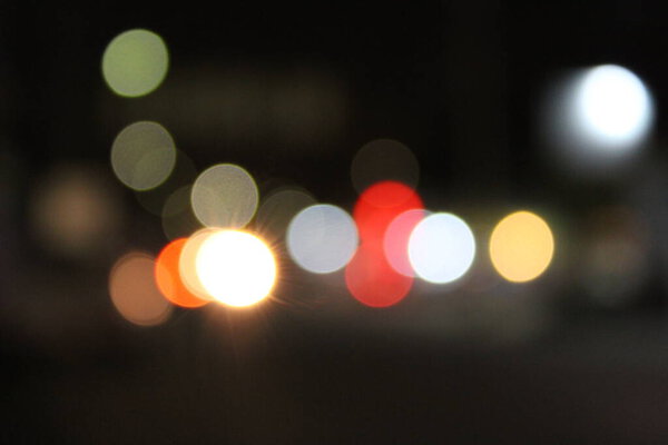 Bokeh from car lights at night - images