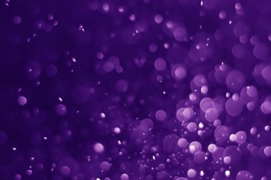 Soyut Bokeh, Violet veya Mor 'un arka planı. Sprey püskürtme resimlerinden proton.