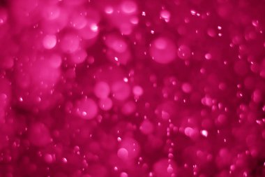 Soyut sahte arkaplan, spreylemeden su görüntüsüne kadar plastik pembe.