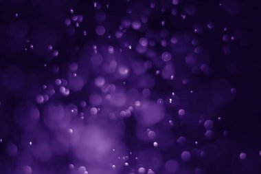 Bokeh mor proton arkaplanı soyut