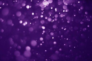 Bokeh mor proton arkaplanı soyut
