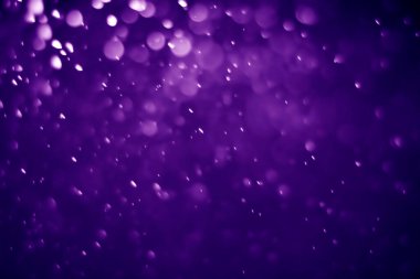 Bokeh mor proton arkaplanı soyut