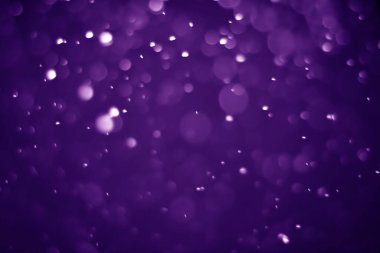 Bokeh mor proton arkaplanı soyut