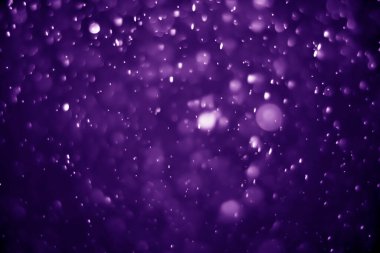 Bokeh mor proton arkaplanı soyut