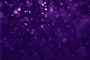 Bokeh mor proton arkaplanı soyut