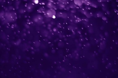 Bokeh mor proton arkaplanı soyut