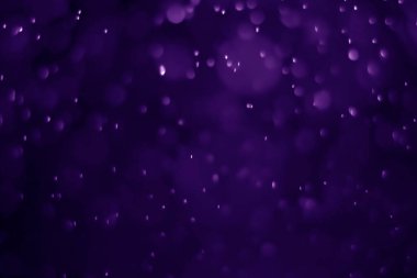 Bokeh mor proton arkaplanı soyut