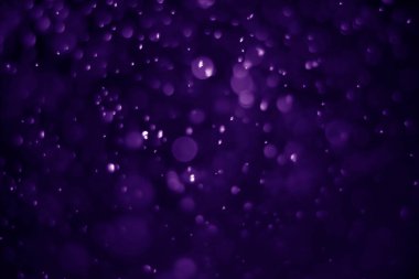 Bokeh mor proton arkaplanı soyut