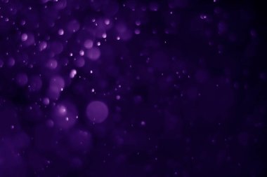 Bokeh mor proton arkaplanı soyut