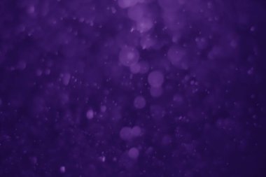 Bokeh mor proton arkaplanı soyut