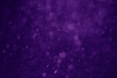Bokeh mor proton arkaplanı soyut
