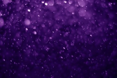 Bokeh mor proton arkaplanı soyut