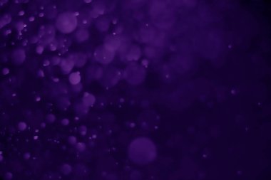 Bokeh mor proton arkaplanı soyut