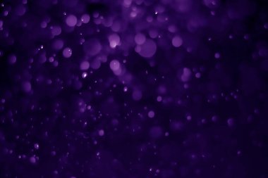 Bokeh mor proton arkaplanı soyut