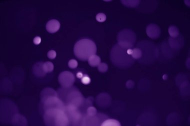 Bokeh mor proton arkaplanı soyut