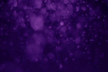 Bokeh mor proton arkaplanı soyut