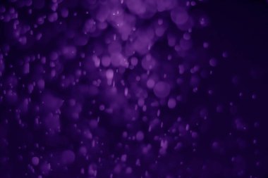 Bokeh mor proton arkaplanı soyut