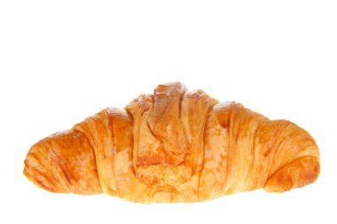 Arka planda taze kruvasanlar var.