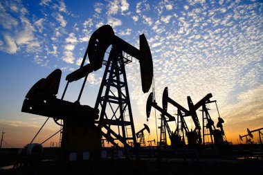 The oil pump, industrial equipment. Oil field site, oil pumps ar