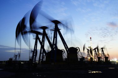 The oil pump, industrial equipment. Oil field site, oil pumps ar