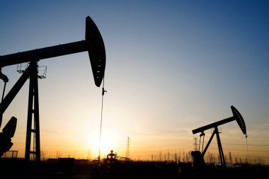 The oil pump, industrial equipment. Oil field site, oil pumps ar